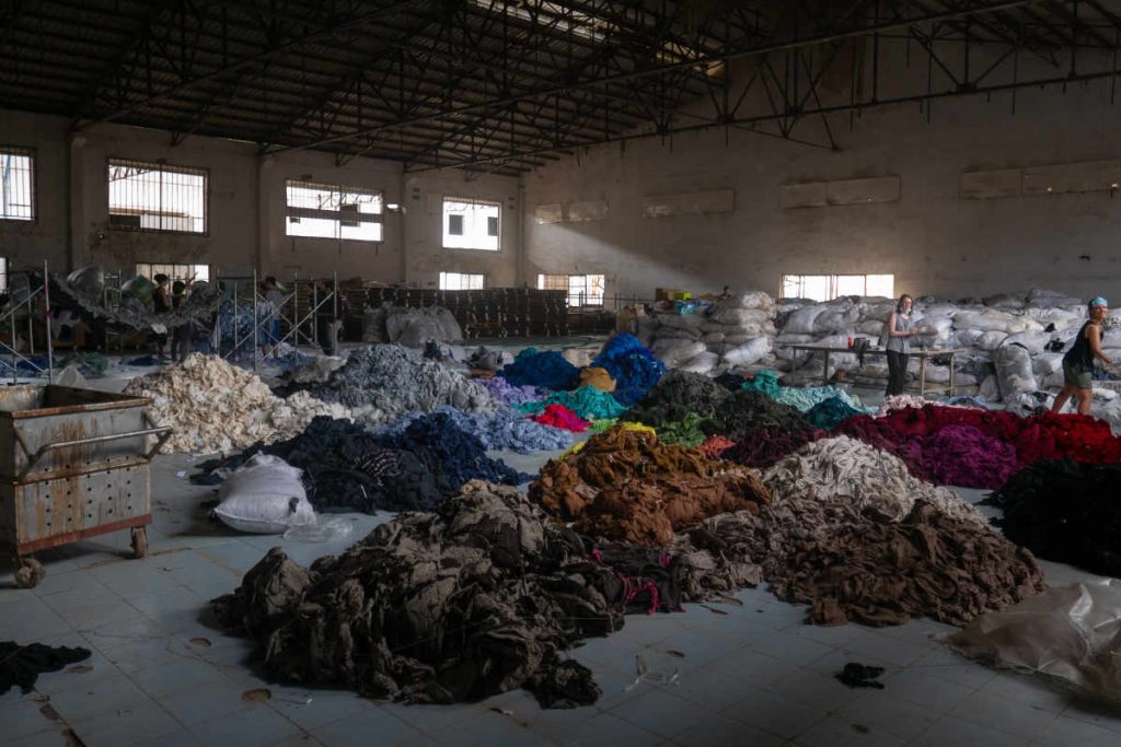 Tons of clothing in an abandoned factory