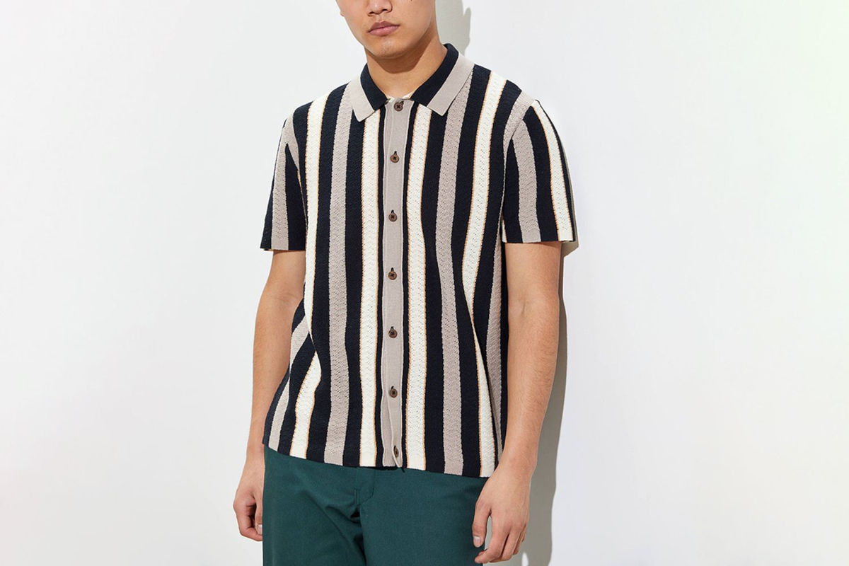Man wearing a striped knit shirt